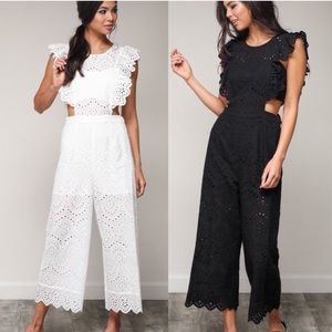 White cutout jumpsuit with ruffle details! 🤍